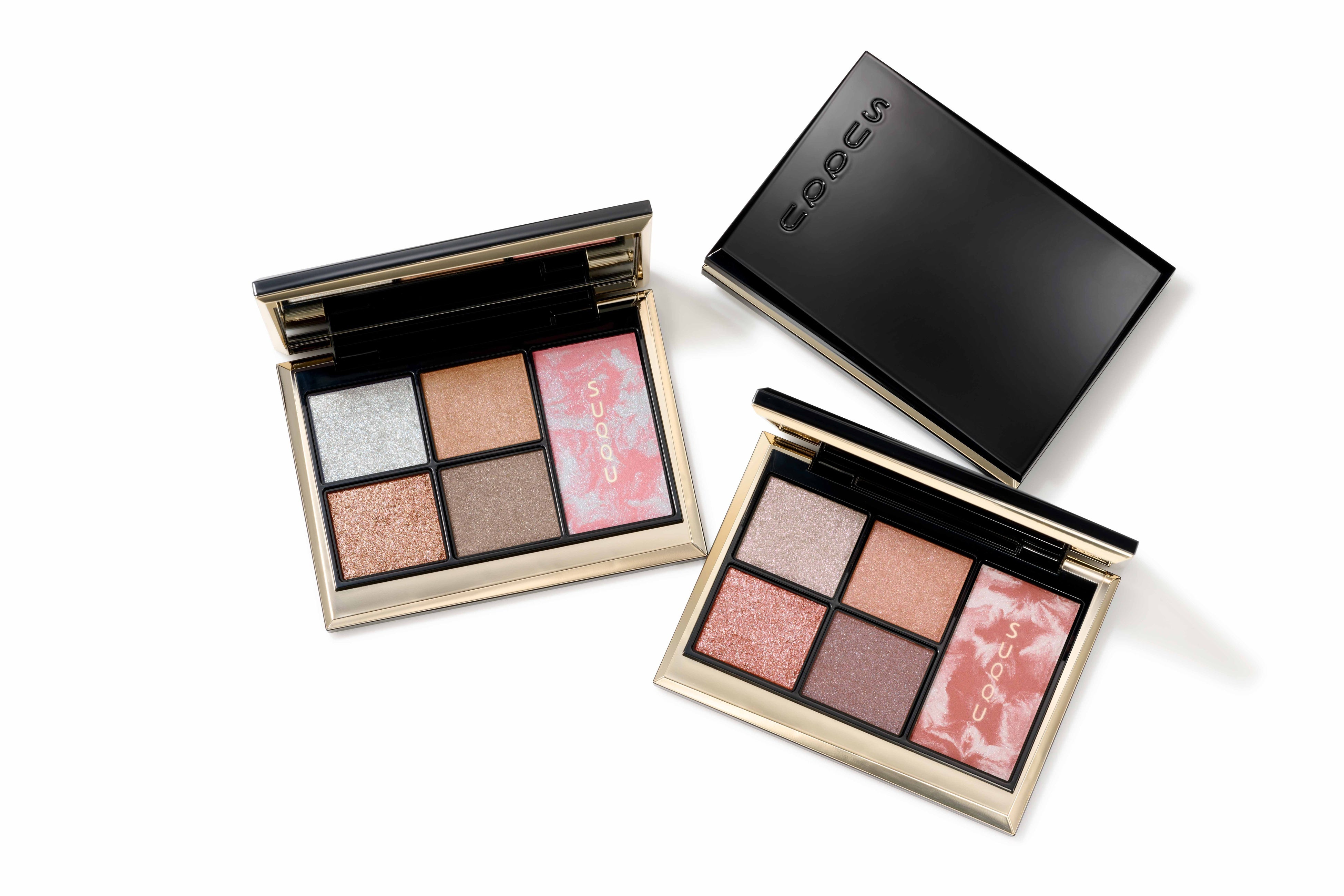 SUQQU’s two open Eye and Face Compacts, showing four eyeshadows and a marbled cheek colour in each.